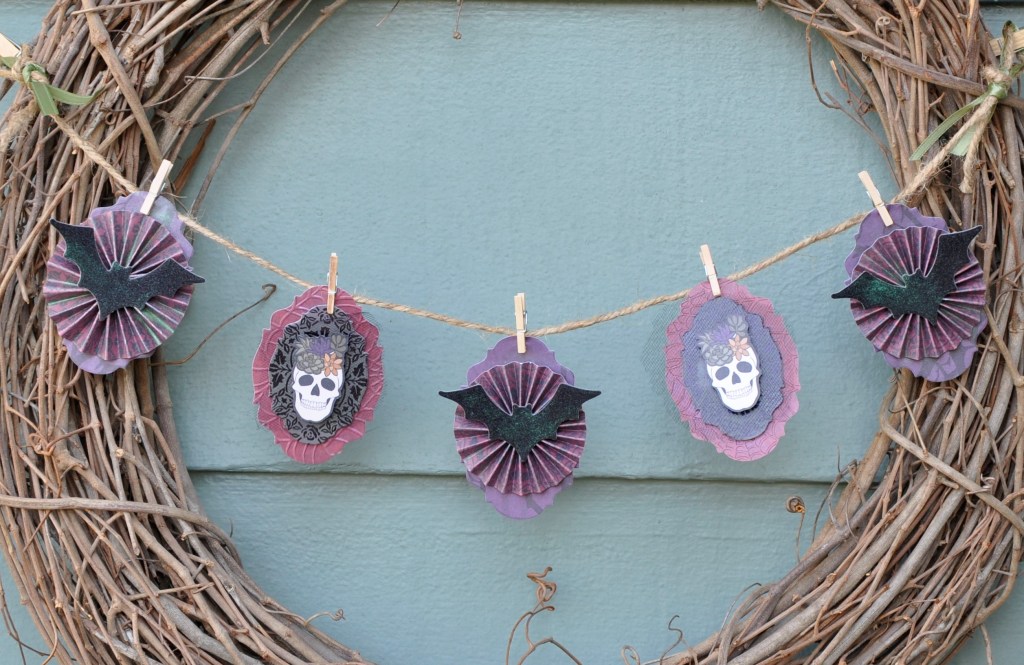 Mini Halloween Banner, fall banner, fall paper banner, halloween banner, dcwv paper, diy halloween banner, diy paper banner, diy banner
#halloweencrafts #halloweenpapercrafts #hallloweendecor #halloweenbanner #stampinup #stampinupcobwebsembossingfolder #stampinupembossingfolder #jimholtz #sizzixthinlits #sizzix #dcwvpaper #dcwvhauntedharvest