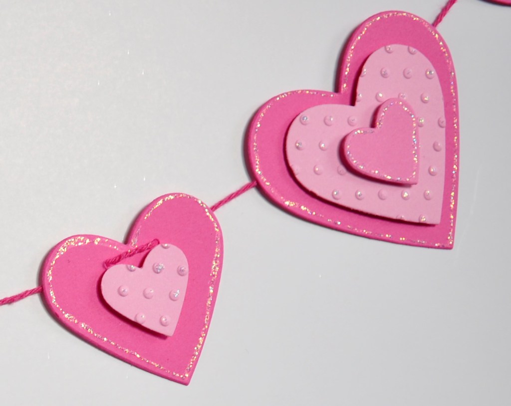 Valentine's Day Projects, paper hearts, pink hearts, paper heart swag, paper heart ornament, paper heart flowers