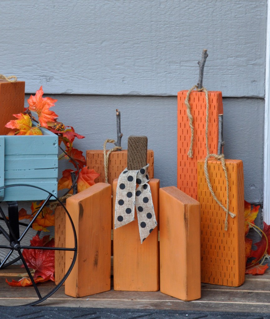 Outdoor Thanksgiving Decor, wood pumpkins, outdoor fall decor, decorating outside for fall, fall wreaths, autumn wreaths, thanksgiving wreaths